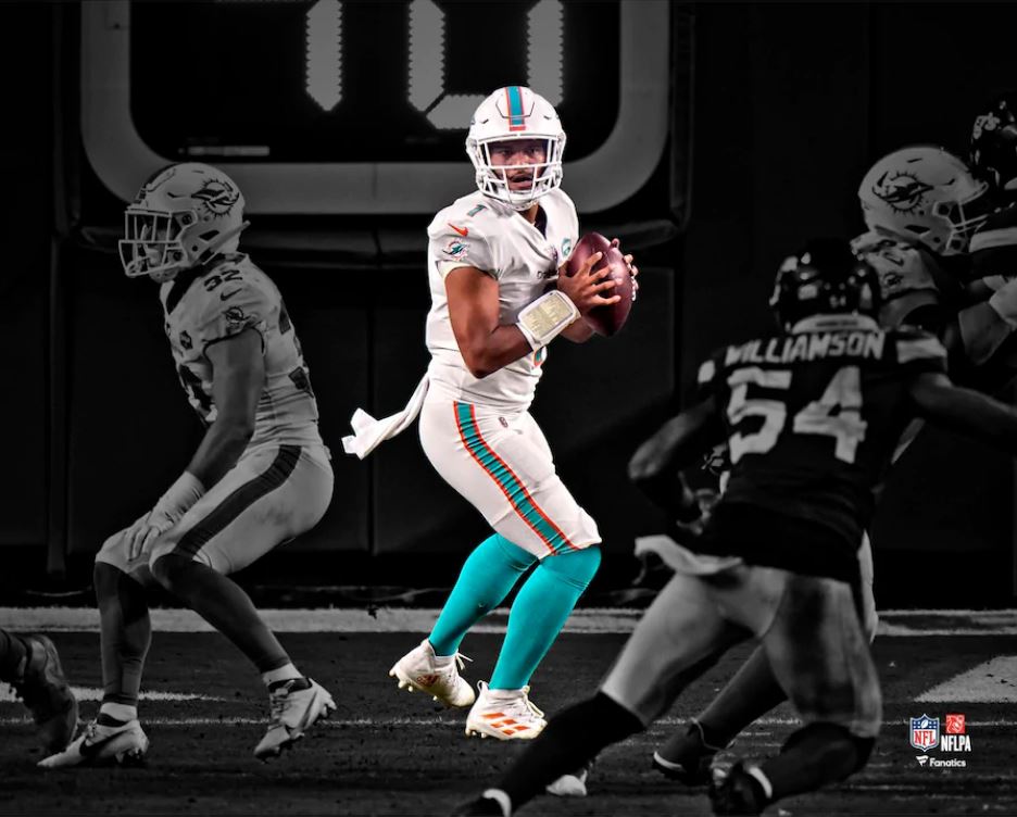 Tua Tagovailoa in Action Miami Dolphins 8 x 10 Blackout Football Photo