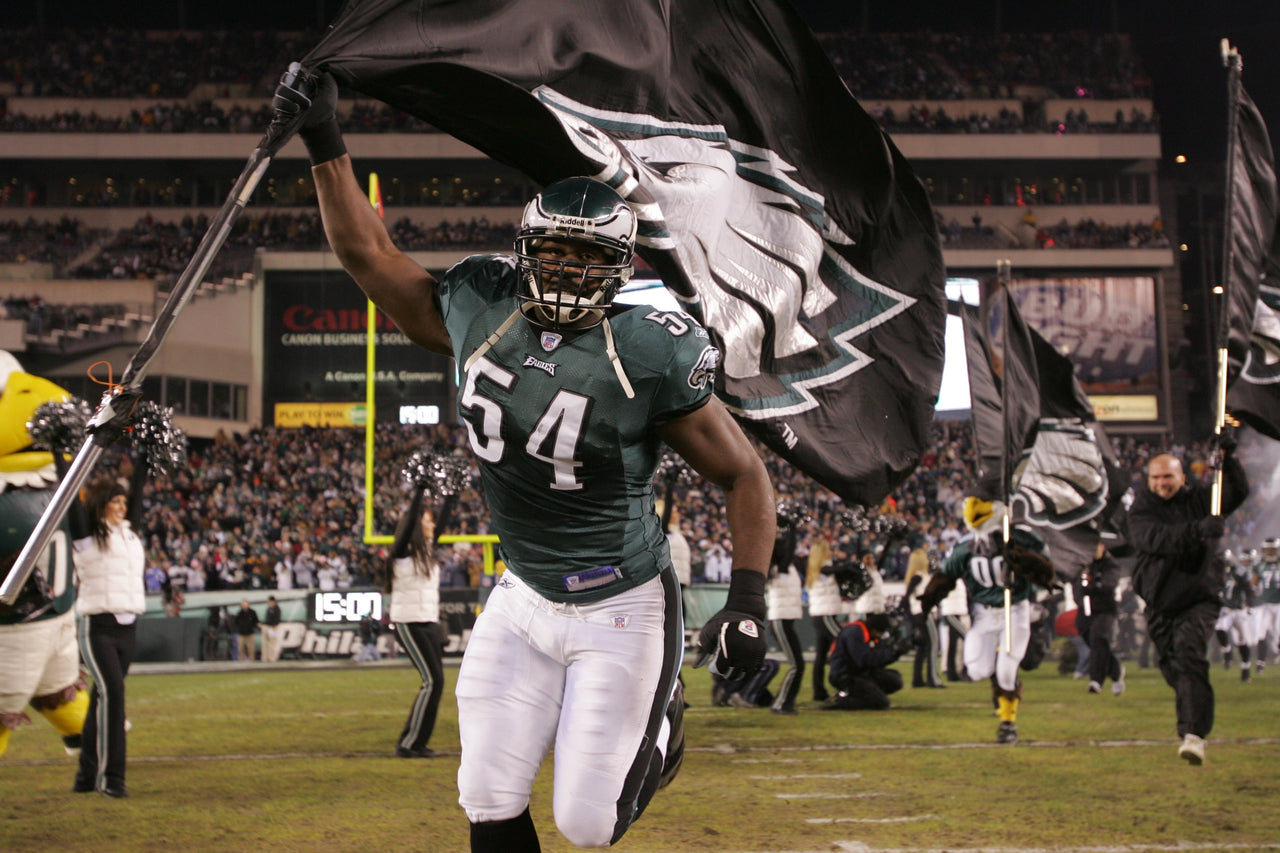 Jeremiah Trotter, Sr. Carries the Team Flag Philadelphia Eagles Football Photo